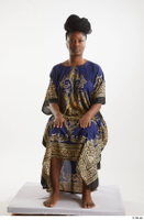  Dina Moses  1 dressed sitting traditional decora long african dress whole body 0007.jpg